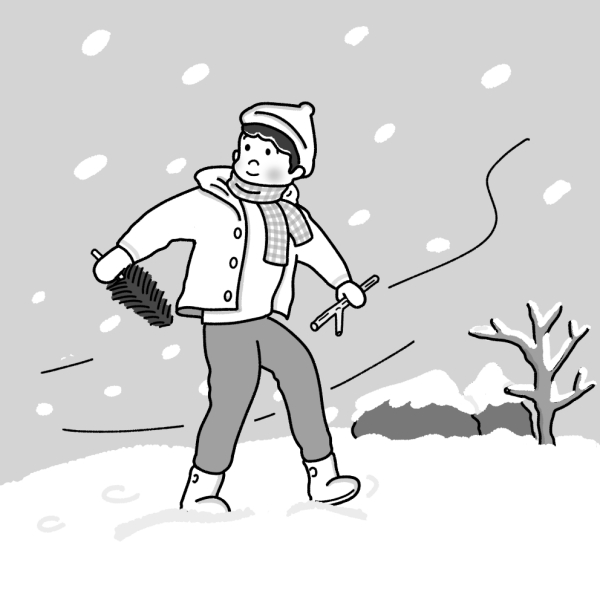 雪の中を歩く少年のモノクロイラスト